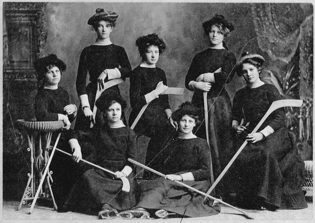 A vintage photograph of a women's ice hockey team